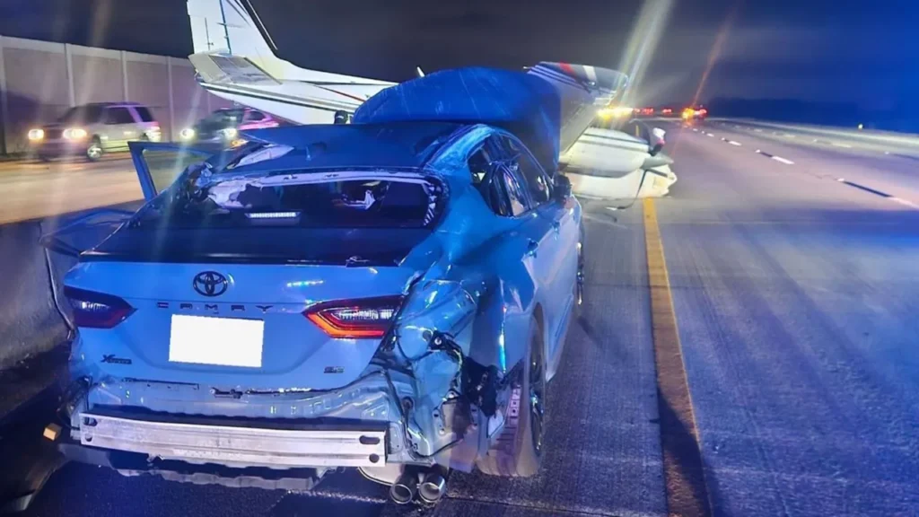 A Beechcraft 55 crash-landed on a Toyota Camry on a Florida freeway Monday night. (Florida Highway Patrol)